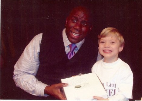Sharon, a Bliss customer, delivered a sweet potato pie to NBA legend Magic Johnson at a recent book signing at Norfolk State University. Her grandson, Carson McConnell, holds our pie with Magic in this picture.